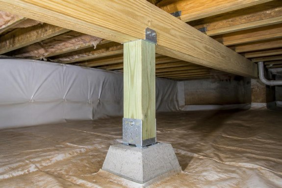 Reinforced crawlspace support post beneath a San Diego raised-foundation home after repair