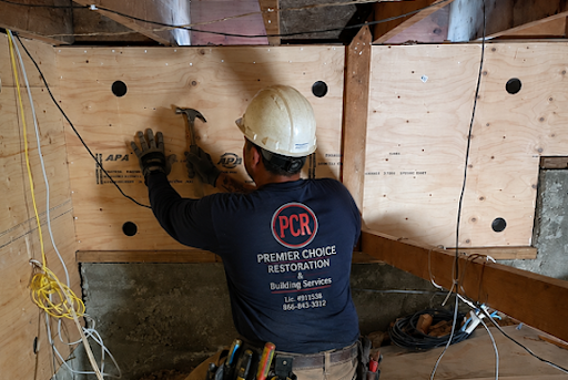 Structural plywood sheathing installed on a cripple wall for seismic reinforcement in San Diego