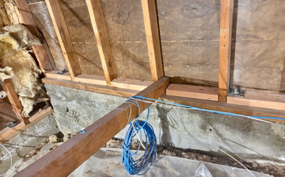 After sill plate anchorage – repaired and securely anchored sill plate with improved foundation connection on a San Diego home