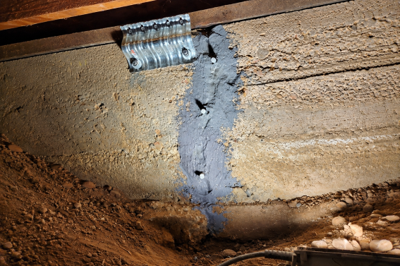 Visible foundation crack on a San Diego residential foundation before repair