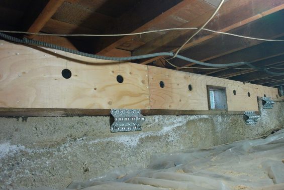 Completed plywood cripple wall bracing inside a San Diego raised-foundation crawlspace