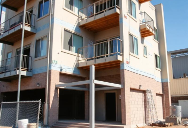 multi-unit-seismic-retrofit-san-diego.webp Completed multi-unit seismic retrofit with plywood cripple wall bracing and foundation anchorage in a San Diego raised-foundation crawlspace