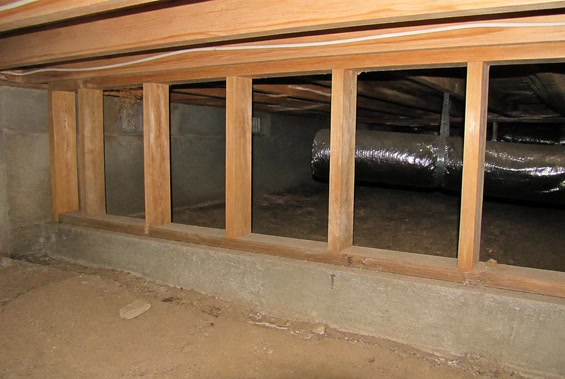 Unbraced wood cripple wall inside a raised-foundation crawlspace in San Diego before reinforcement